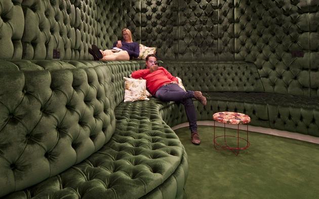 Authentic dark green padded room like a pub