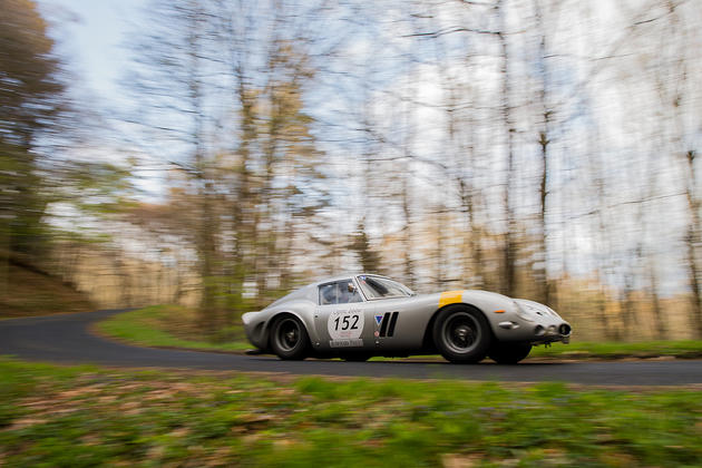 Ferrari Spyder flying around a corner