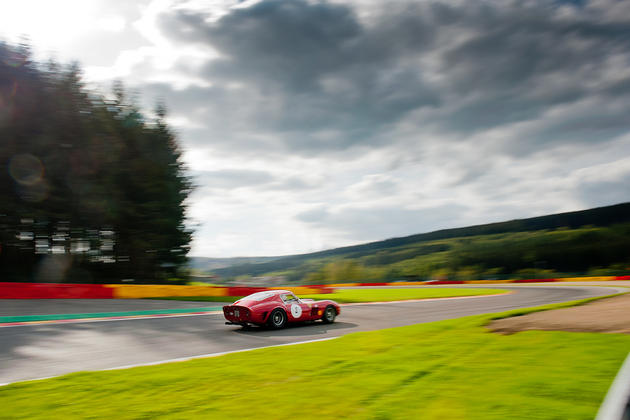 Ferrari GTB Going Fast on Racetrack