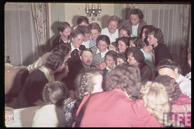 women crowded around hitler