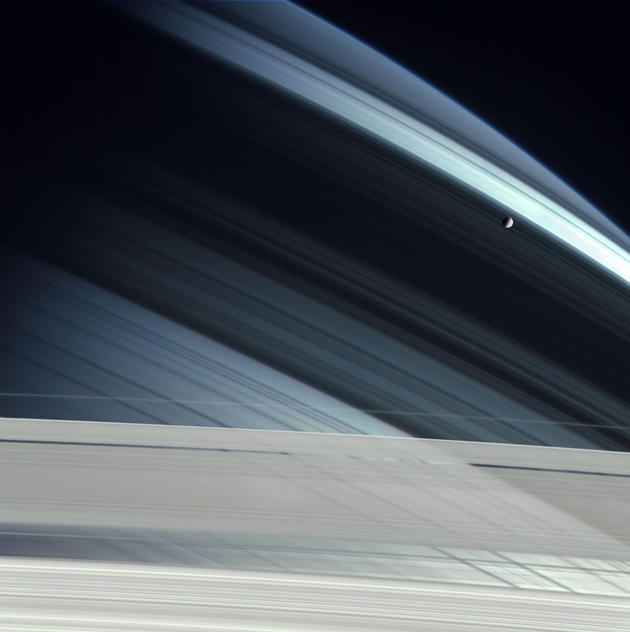 Mimas over Saturn
