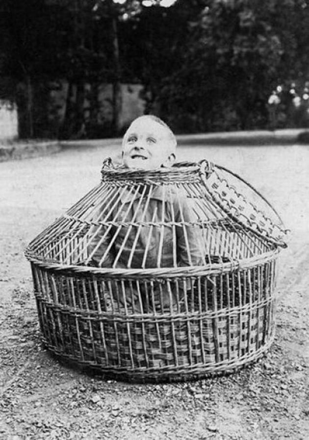 Old Weird Photos kid in cage