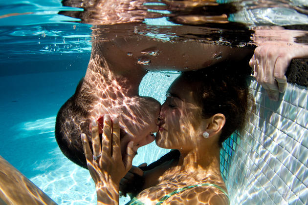 Underwater couple kissing Sarah Lee