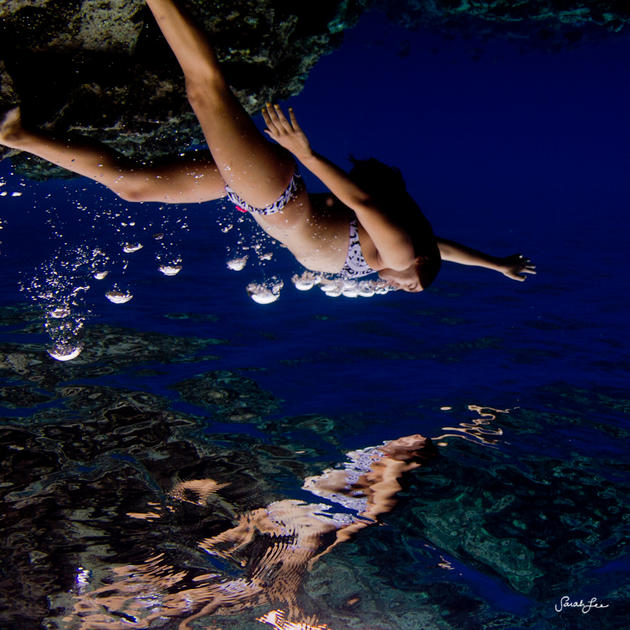 Amazing photo of a reflection of a diver