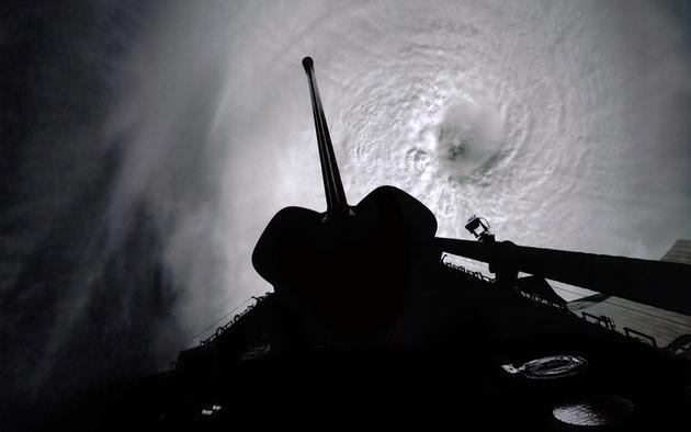 Shuttle Columbia over Typhoon Owen