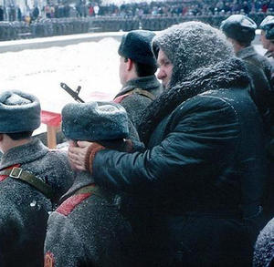 Grand mother in Russia warming ears