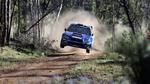 Subaru STi catching air Rally Wallpaper